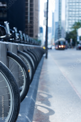 Photography Toronto streetcar on busy street bike rental station public transport
