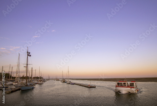 Olhao recreational boat Marina at dusk, the city is capital of Ria Formosa wetlands natural conservation park, in Algarve. © Carlos Neto