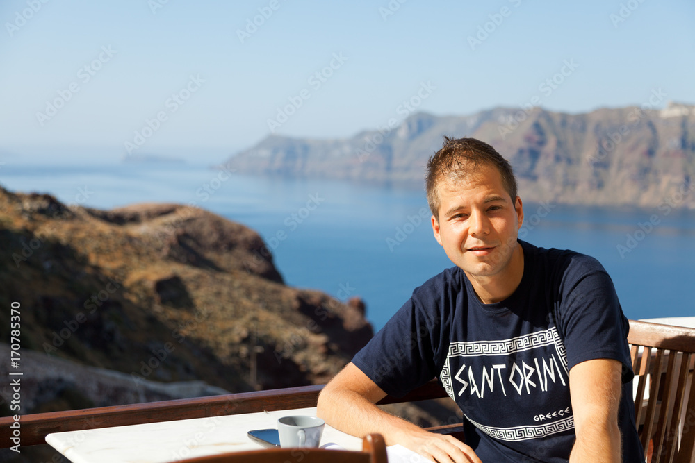 Young man in a summer resort, Santorini