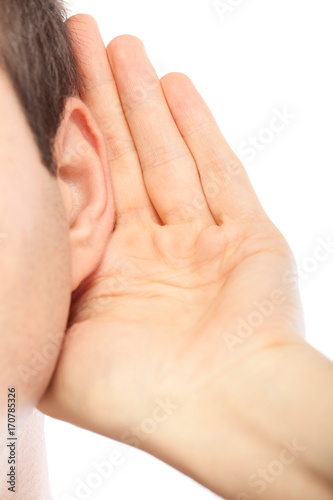 Young man listening to gossip