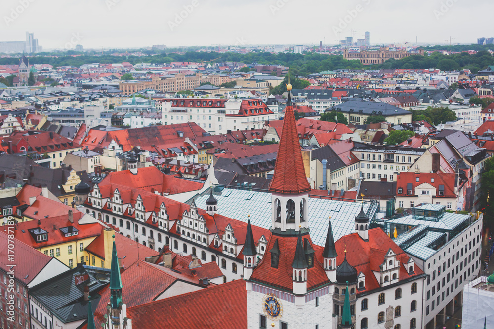 Fototapeta Beautiful super wide-angle sunny aerial view of Munich, Bayern, Bavaria, Germany with skyline and scenery beyond the city, seen from the observation deck of St. Peter Church