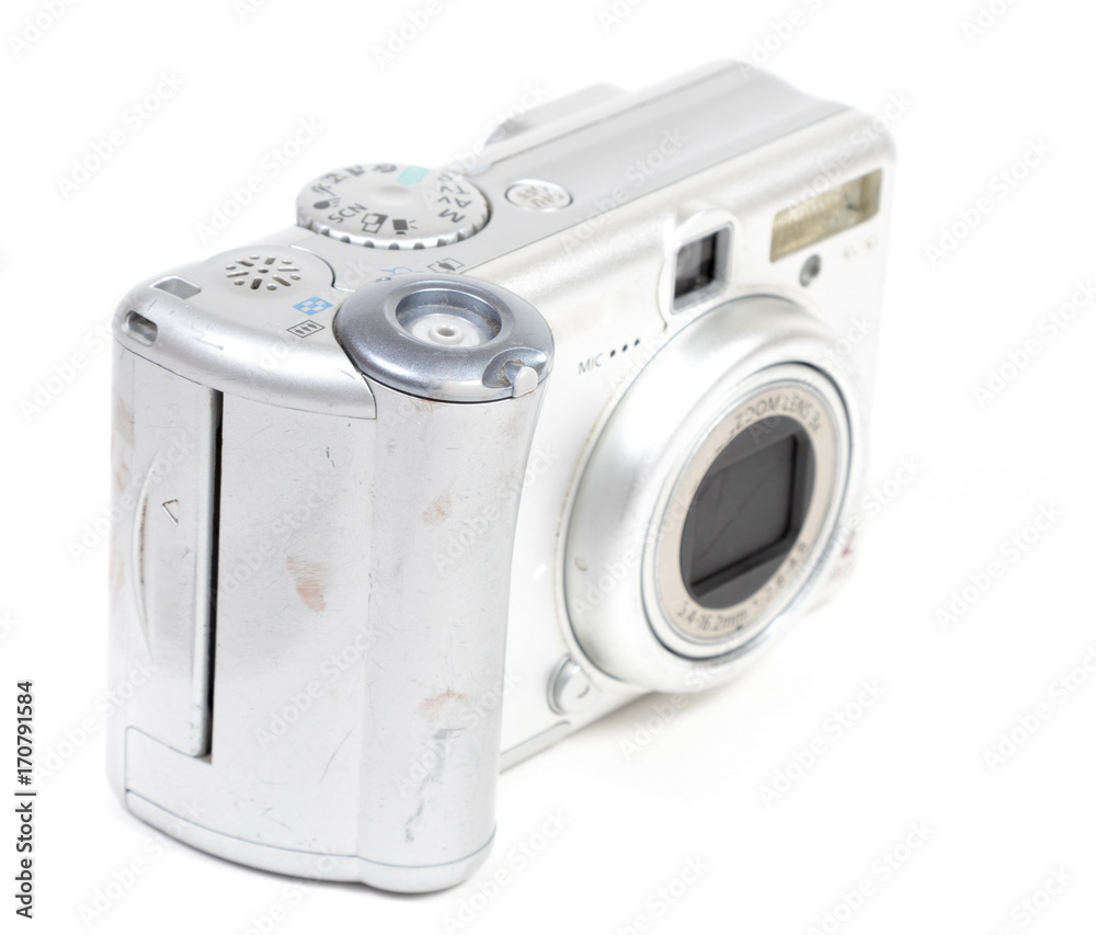 Old digital camera on a white background