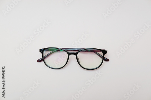 Glasses on a pink background. Fashionable glasses for the eyes. Trend of the year.