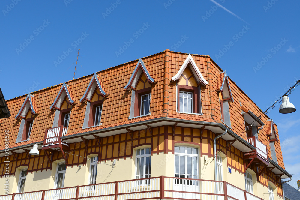 Traditional medieval  house exterior with new tile roof in Le Touquet-Paris-Plage