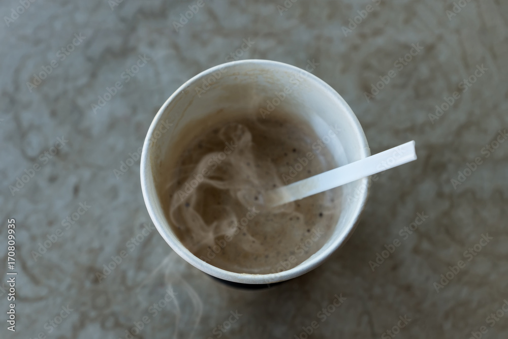 Morning coffee in paper glass.