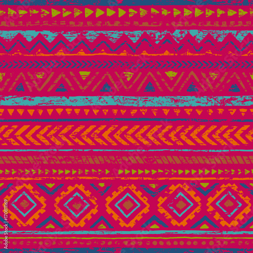 Vintage seamless geometric pattern. Ethnic and tribal motifs. Horizontal lines. Grunge texture, scratches. Pink, blue, orange and green colors.