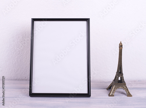 Photo frames together figure of the Eiffel Tower. Decor.