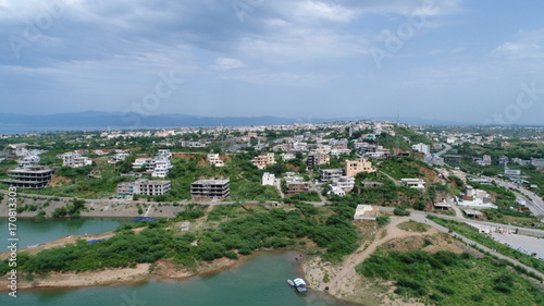 view of over population and greenery and cloudy sky