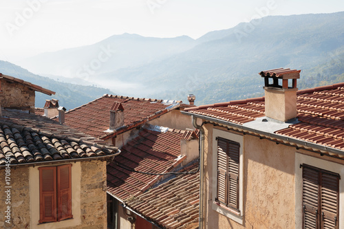 View of the tiled roofs of the old town of France photo