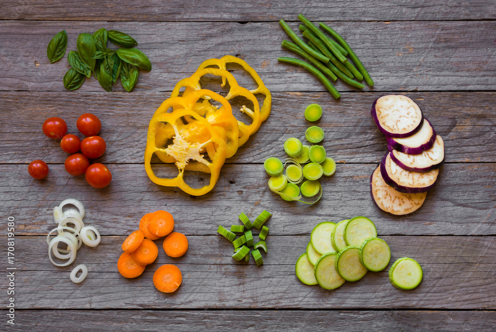 Mixed vegetables on wooden table Mixed vegetables on wooden table