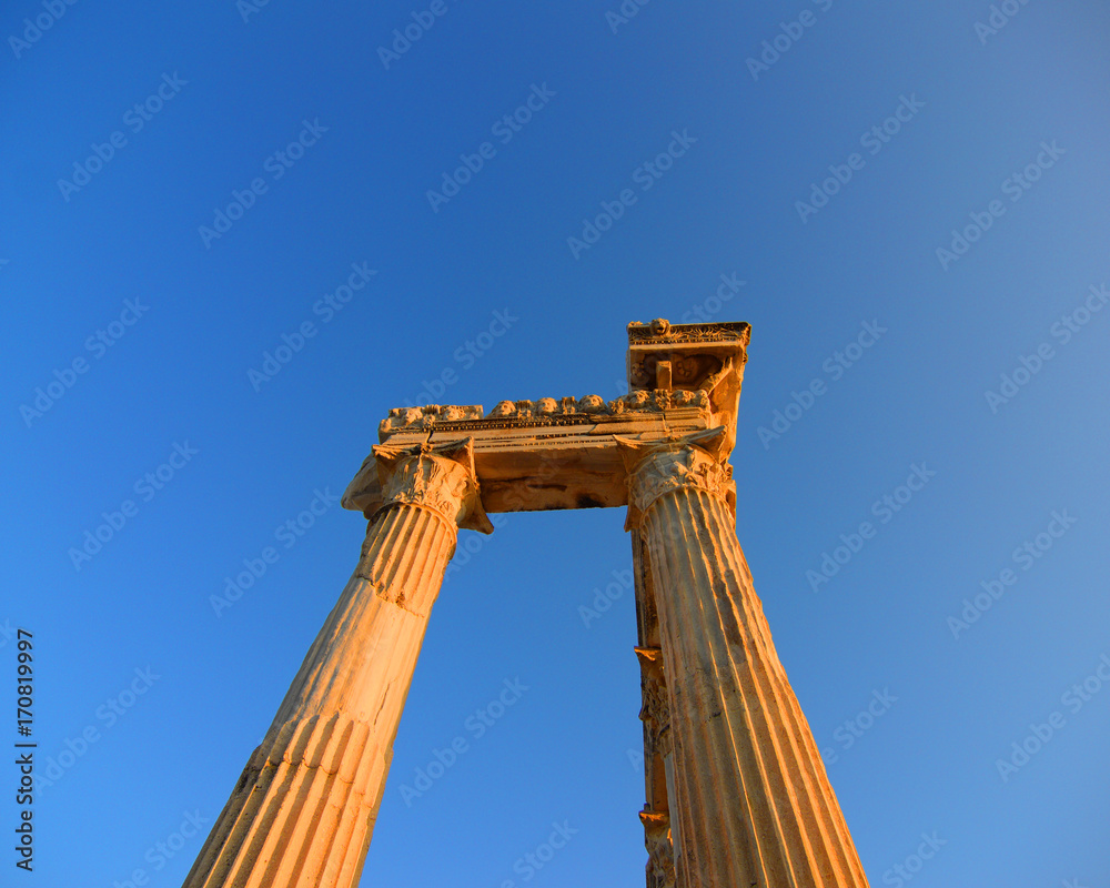 Temple of Apollo with a beautiful sunset background, in Side, Antalya, Turkey. Temple of Apollo with a beautiful sunset background, in Side, Antalya, Turkey.