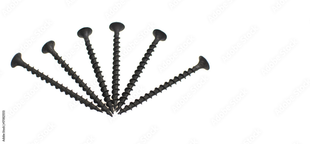 Black screws for wood isolated on white background , top view