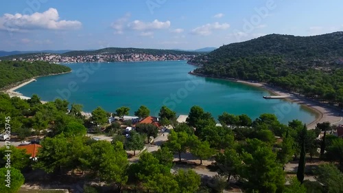 Beautiful aerial view of the picturesque bay  on sunny day. On the other side of the bay is a small Croatian town. 2K7 video.