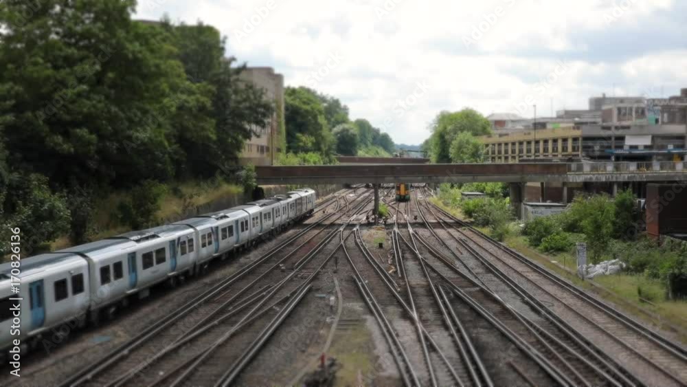 Railroad and trains passing, aerial view, fast motion Railroad and trains passing, aerial view, fast motion