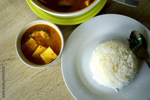 Thai meal with rice and sour soup