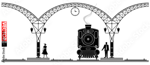 An ancient arched metal building of the railway station. People and steam locomotiv on the platform. Black profile