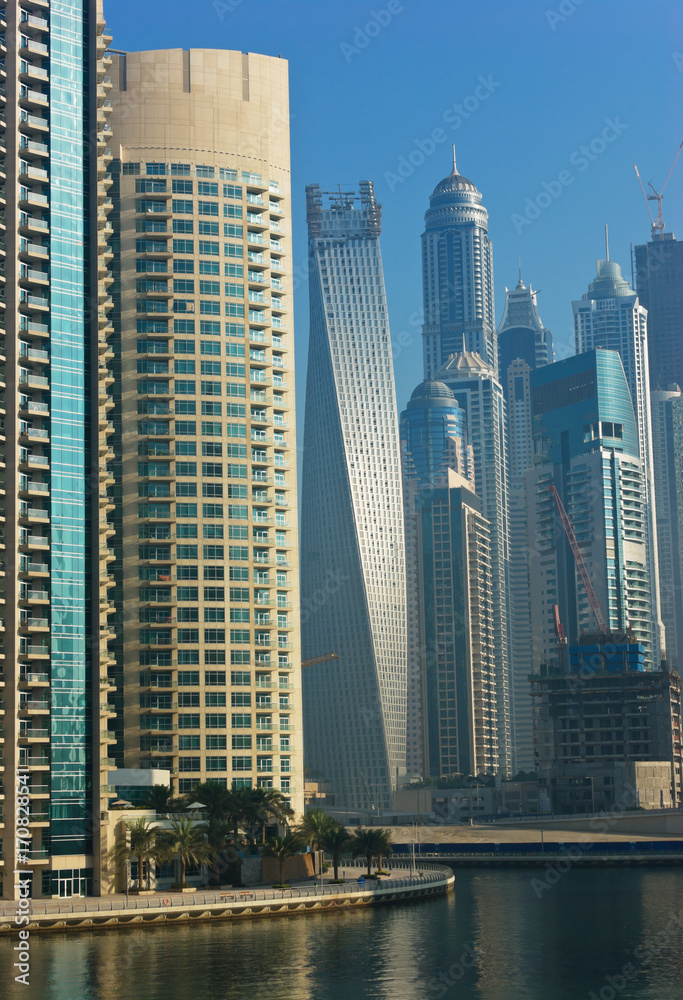 Fototapeta premium modern city on the bay in the morning mist