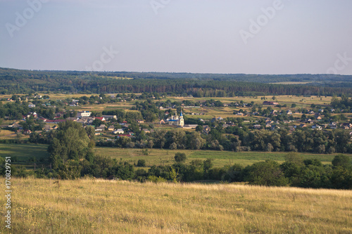 Summer sunny landscape at sunset of the day outside the city. © prokop.photo