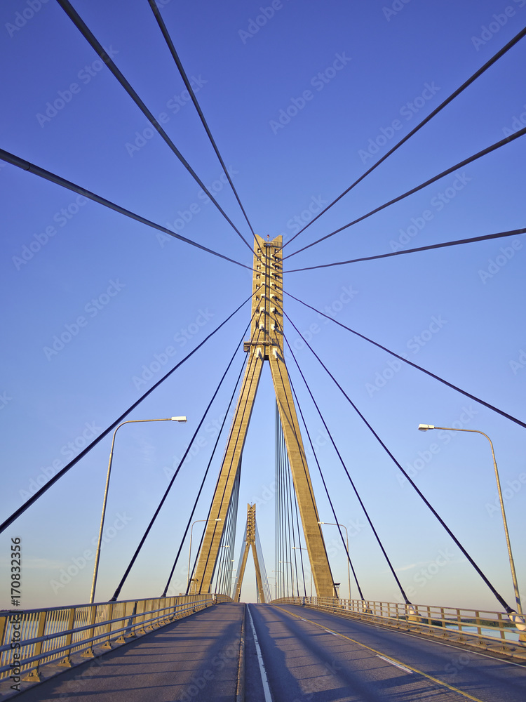 Pylons and cables of cable-stayed bridge. Architectural background.