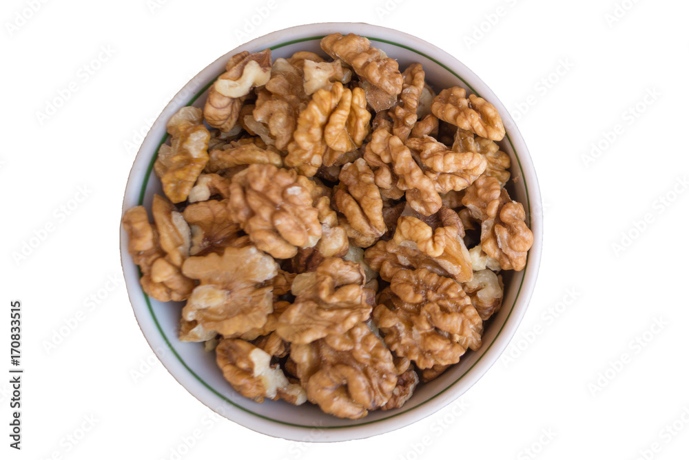 White ceramic bowl with walnuts isolated on white background White ceramic bowl with walnuts isolated on white background