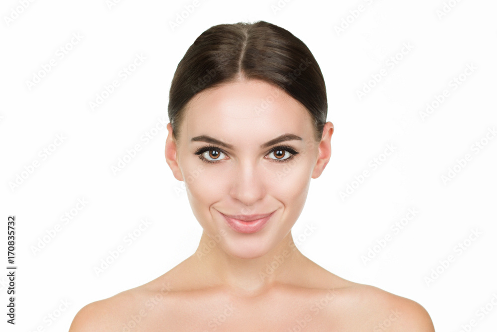 Beautiful face of the young woman with clean skin and natural makeup Beautiful face of the young woman with clean skin and natural makeup