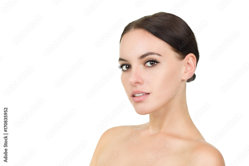 Beautiful face of the young woman with clean skin and natural makeup