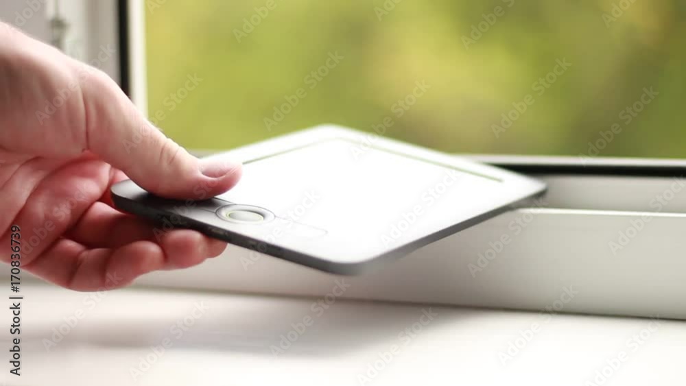 Taking the electronic book and putting it back Taking the electronic book and putting it back
