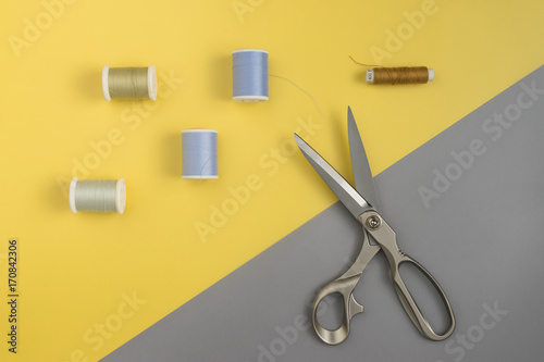 top view of tools for handicraft sewing on wood texture, space for input text