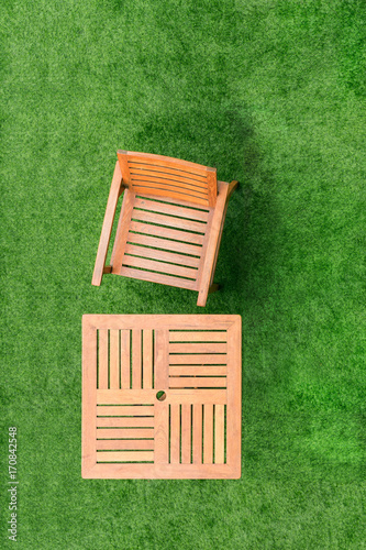 top view wood table and chair table on grass