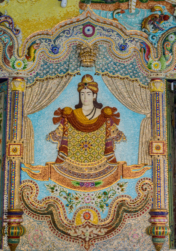 Traditional Thai style sculptures and painting in church under decoration of Wat Pariwas in Bangkok, Thailand.