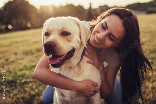 Photography Young woman with dog