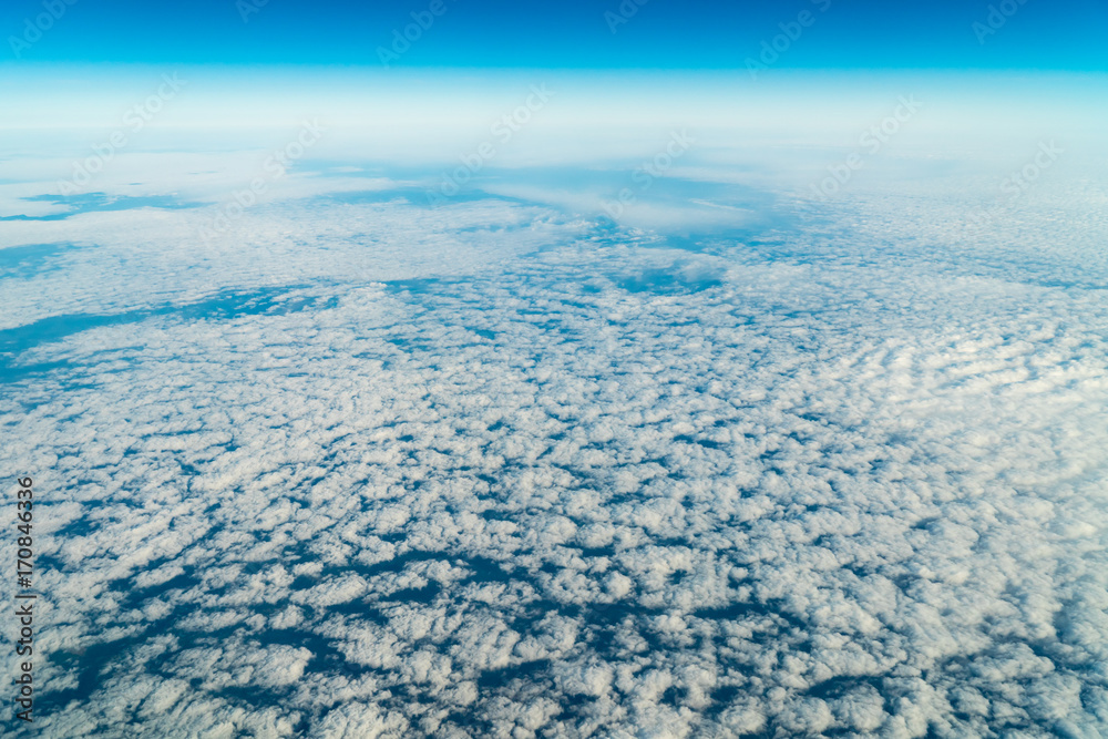 Obraz premium Flying Through Beautiful Landscape Of Earth Clouds