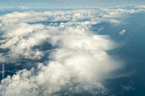 Fototapeta Naklejka Na Ścianę i Meble -  Flying Through Beautiful Landscape Of Earth Clouds