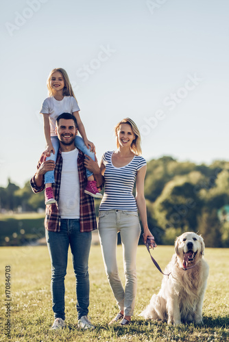 Photography Happy family with dog