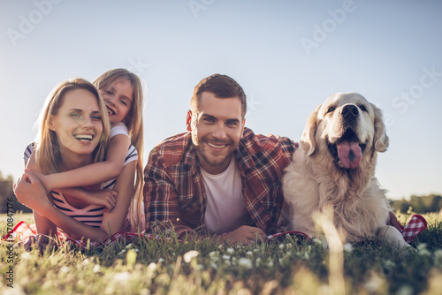 Photography Happy family with dog
