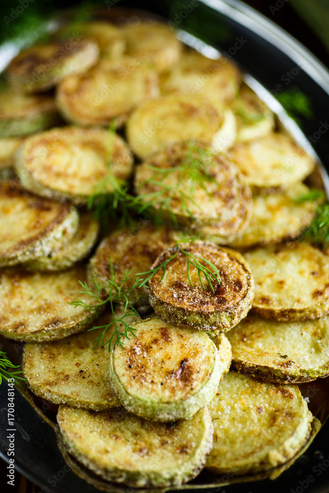 zucchini roasted slices in a plate zucchini roasted slices in a plate