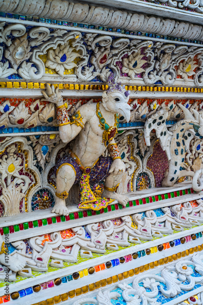 Obraz premium High Relief Sculpture of animal and monster decorated with ceramic, Wat Pariwat Temple,Bangkok,Thailand