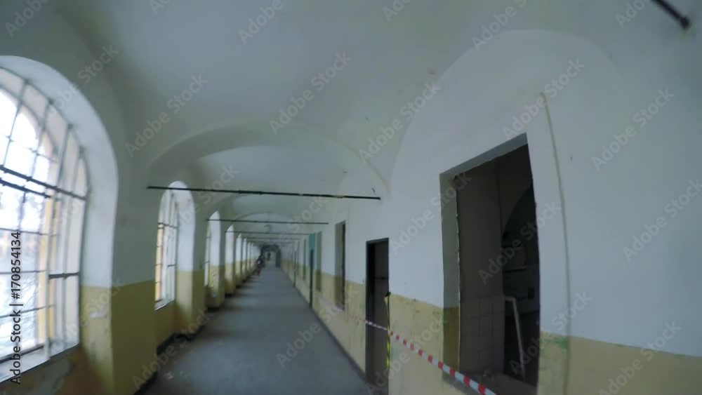 POV GoPro - a man runs down a corridor of an old building at a race POV GoPro - a man runs down a corridor of an old building at a race
