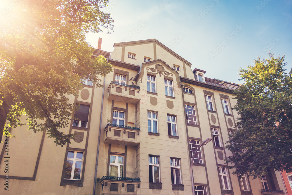 Naklejka premium beautiful historical house in warm sunlight