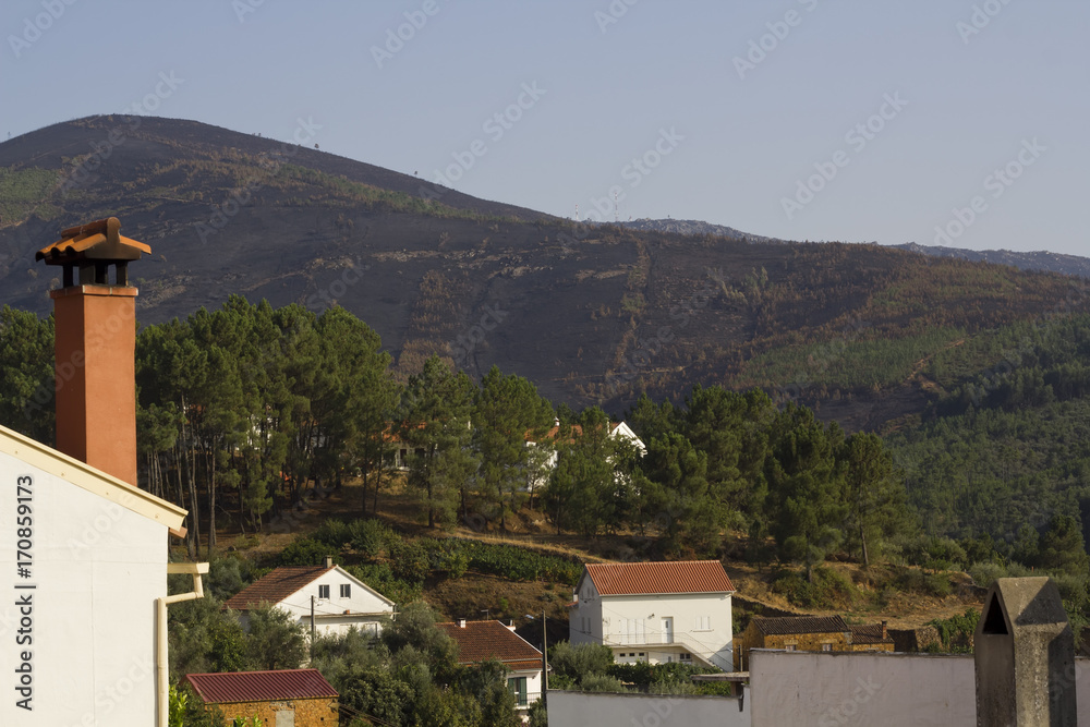 Village houses and  mountains
