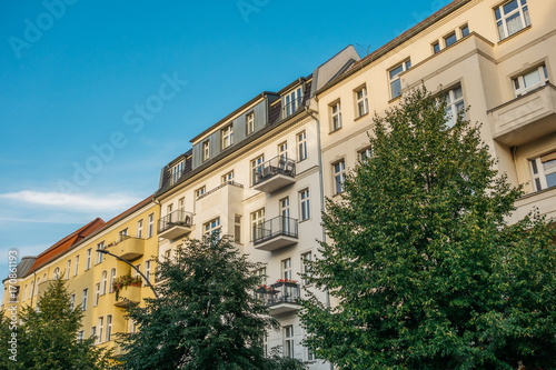 typical berlin houses in a street at summer © Robert Herhold