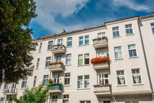 typical berlin houses with green trees