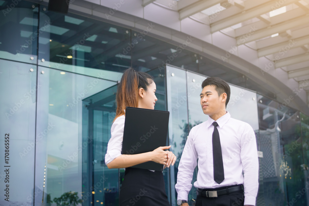 Asian business couple talking about future about working. Asian business couple talking about future about working.
