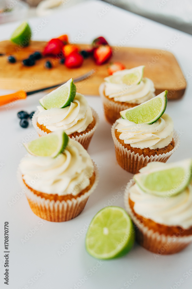 .Cupcakes with cream and lime. Baking. .Cupcakes with cream and lime. Baking.