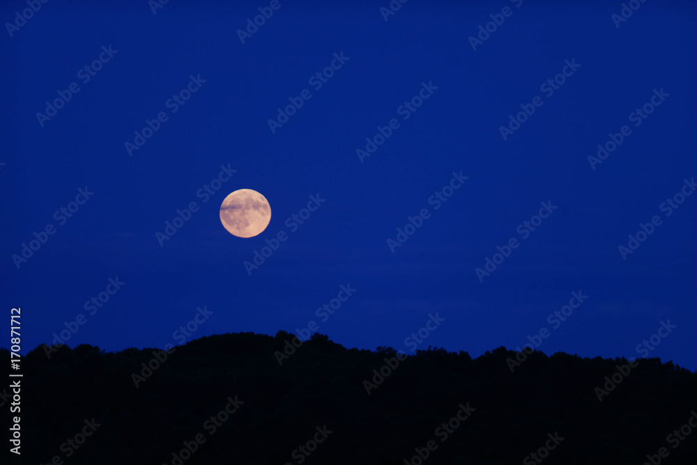 Full September Corn Moon rising on an Indiana farm Full September Corn Moon rising on an Indiana farm