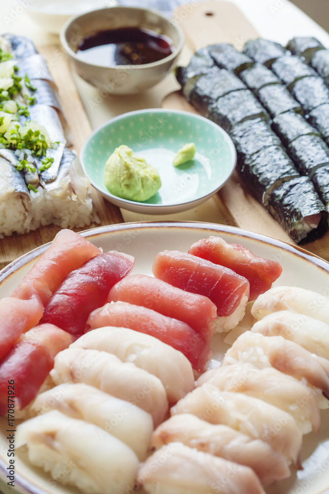 Kitchen table with Japanese sushi Kitchen table with Japanese sushi