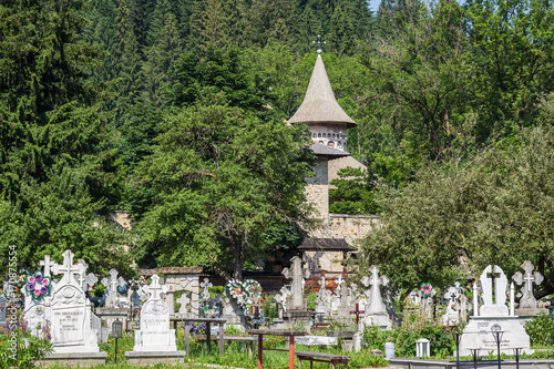 View of old cemetery near the Voronet orthodox monastery in Romania