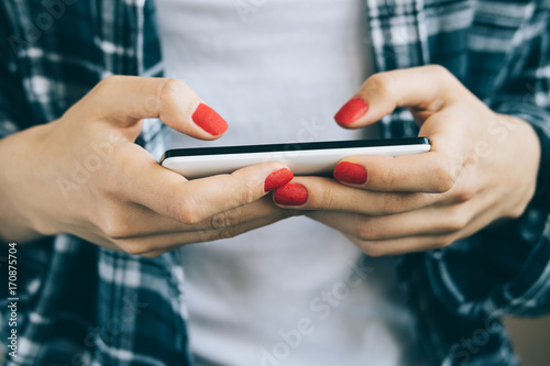 Mobile phone in female hands