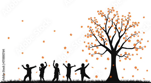 Happy children in the autumn park