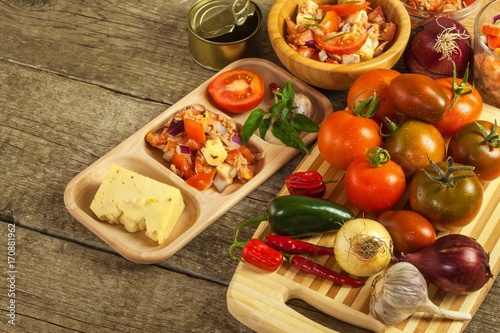 Homemade salad of tomato, cheese and chili peppers. Healthy diet food. Healthy breakfast.